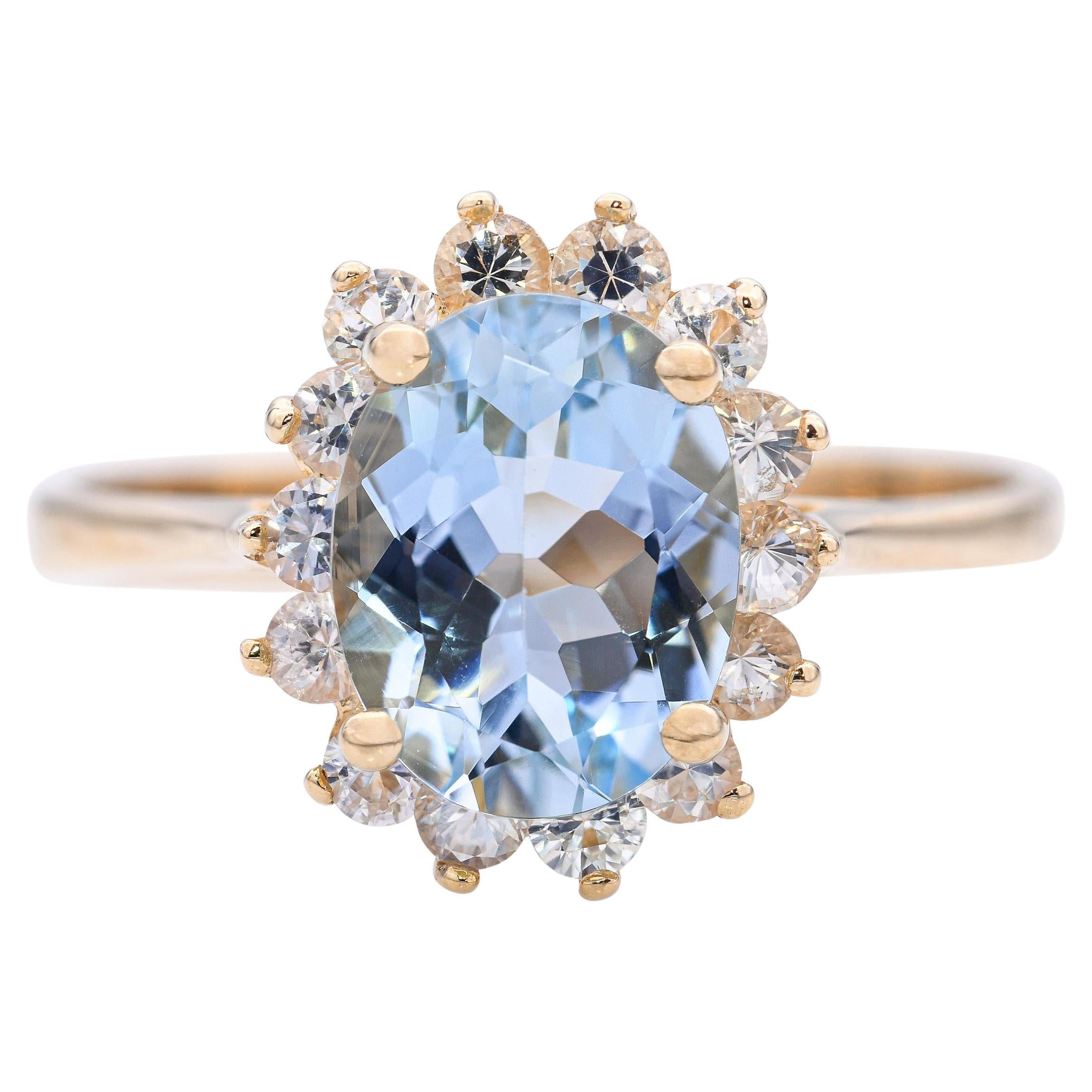 Bague en or jaune 14k avec halo d'aigue-marine et de diamant en vente
