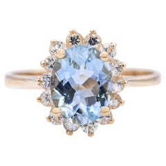 Bague en or jaune 14k avec halo d'aigue-marine et de diamant