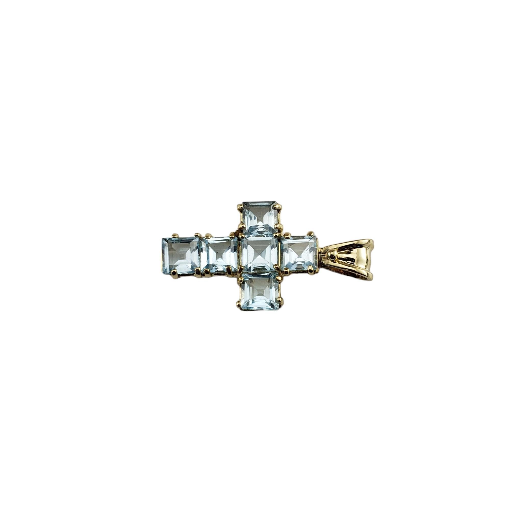 Vintage 14K Yellow Gold Aquamarine Cross Pendant -

This lovely cross pendant features six square cut aquamarine stones (5.0 mm x 5.0 mm) set in classic 14K yellow gold.  

Total aquamarine weight: 3.54 ct.

Size: 24 mm x 15 mm

Stamped: Italy
