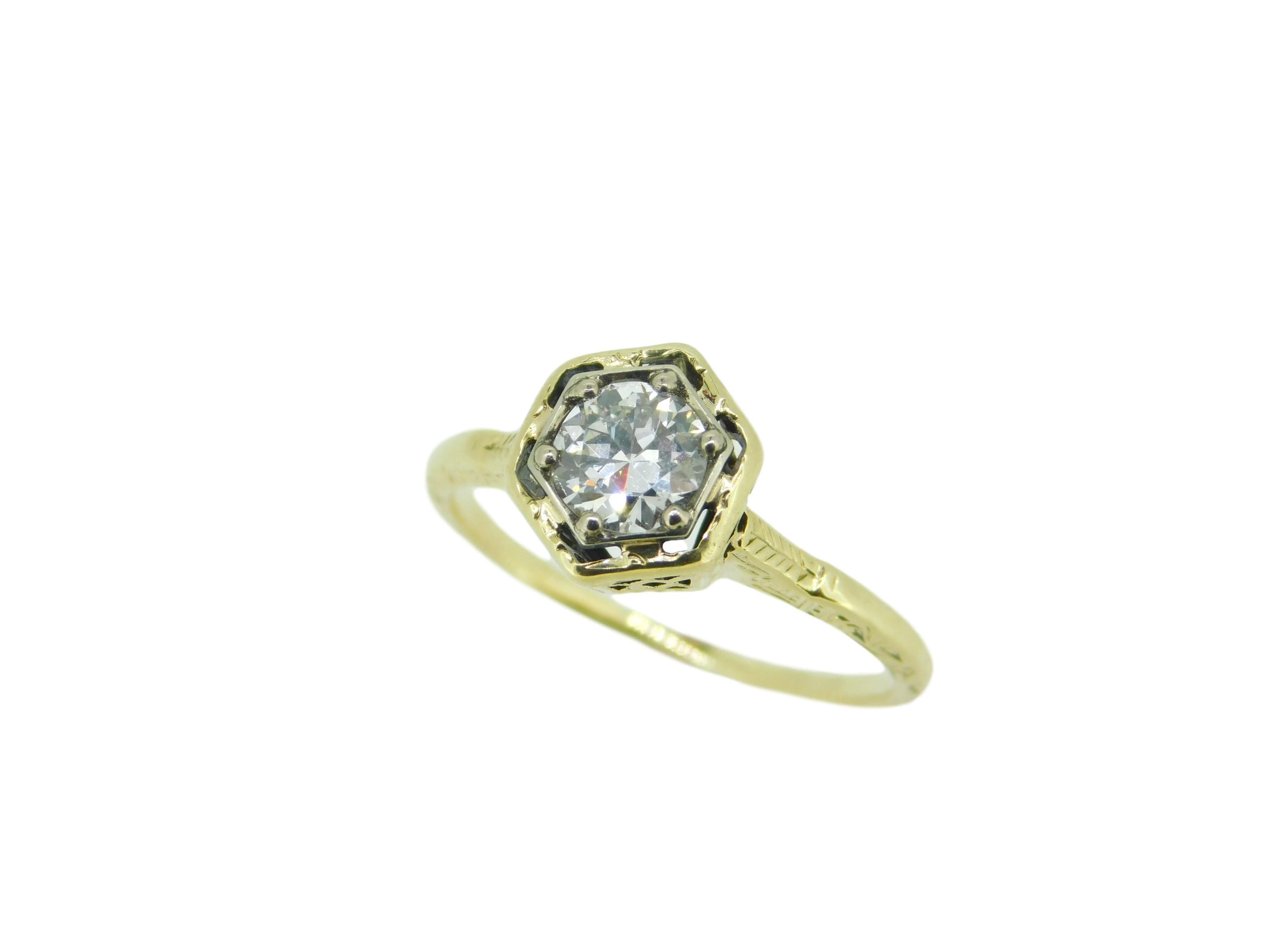 14k Yellow Gold Art Deco 1/2ct Genuine Natural Diamond Ring (#J4629)

Art Deco 14k yellow gold diamond ring featuring a round brilliant cut diamond weighing .52cts and measuring about 5mm. The diamond has H color and VS2 clarity. The antique yellow
