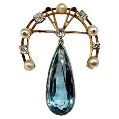 14K yellow gold Art Nouveau brooch with aquamarine, pearls, and diamonds