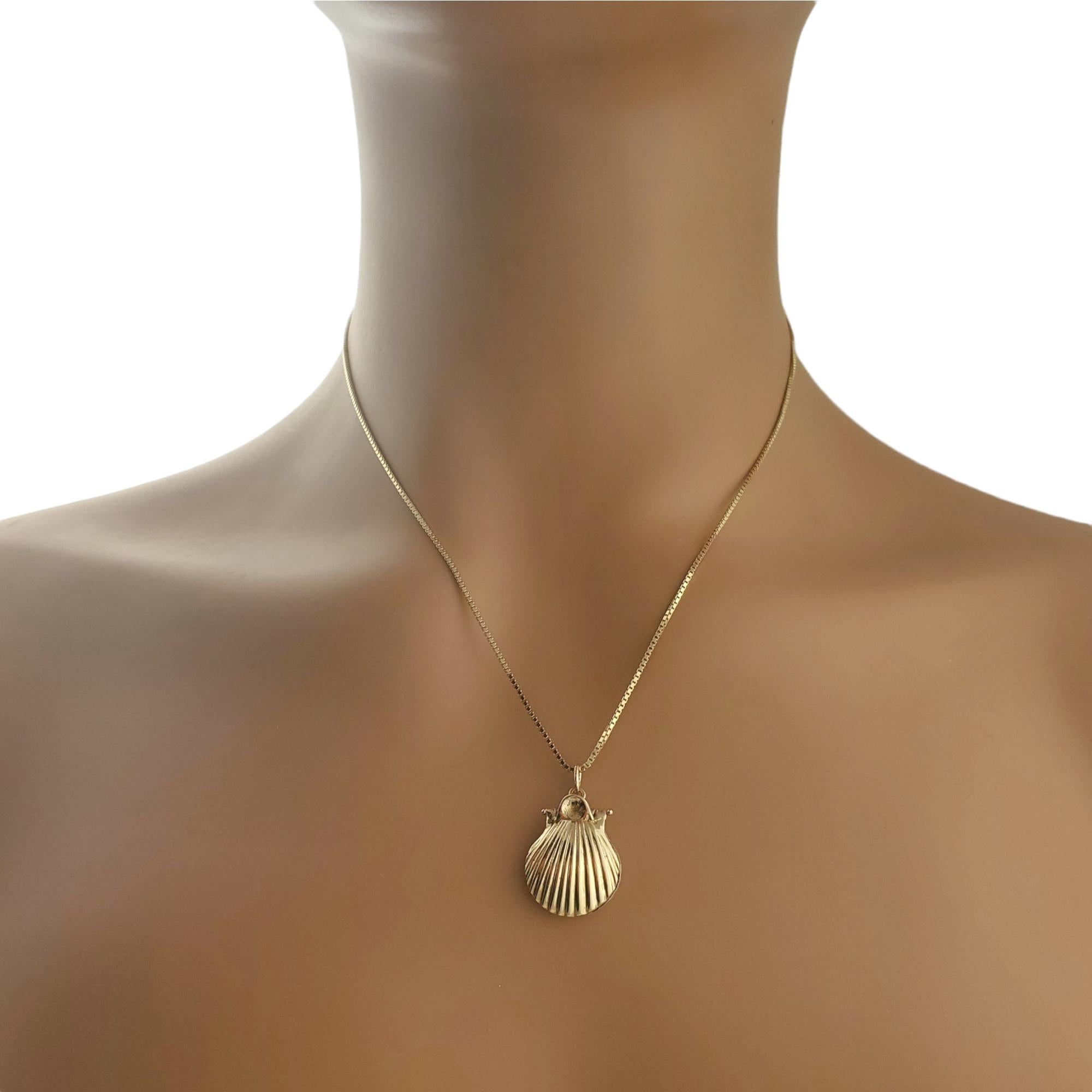14K Yellow Gold Articulated Clam Shell 1