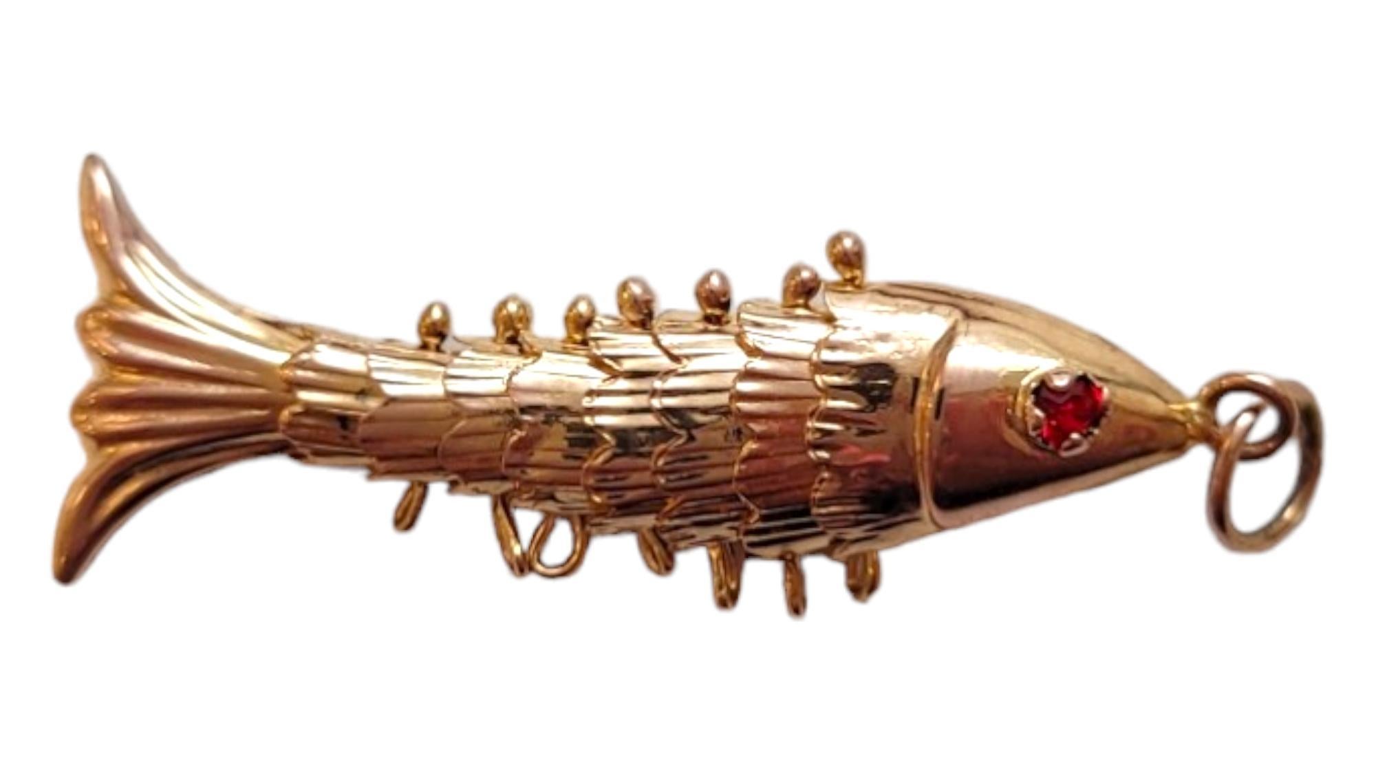 14K Yellow Gold Articulated Fish Charm - 

This adorable fish charm simulates the movement of a real fish and is the perfect addition to your collection! 

Size: 30.70mm X 10.98mm X 5.7mm

Weight: 0.65 dwt/ 1.01 g

Hallmark: 14K 585

Very good