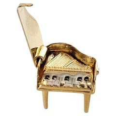 Charm per pianoforte articolato in oro giallo 14K #17804