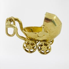 14 Karat Yellow Gold Articulating Baby Carriage Charm Pendant