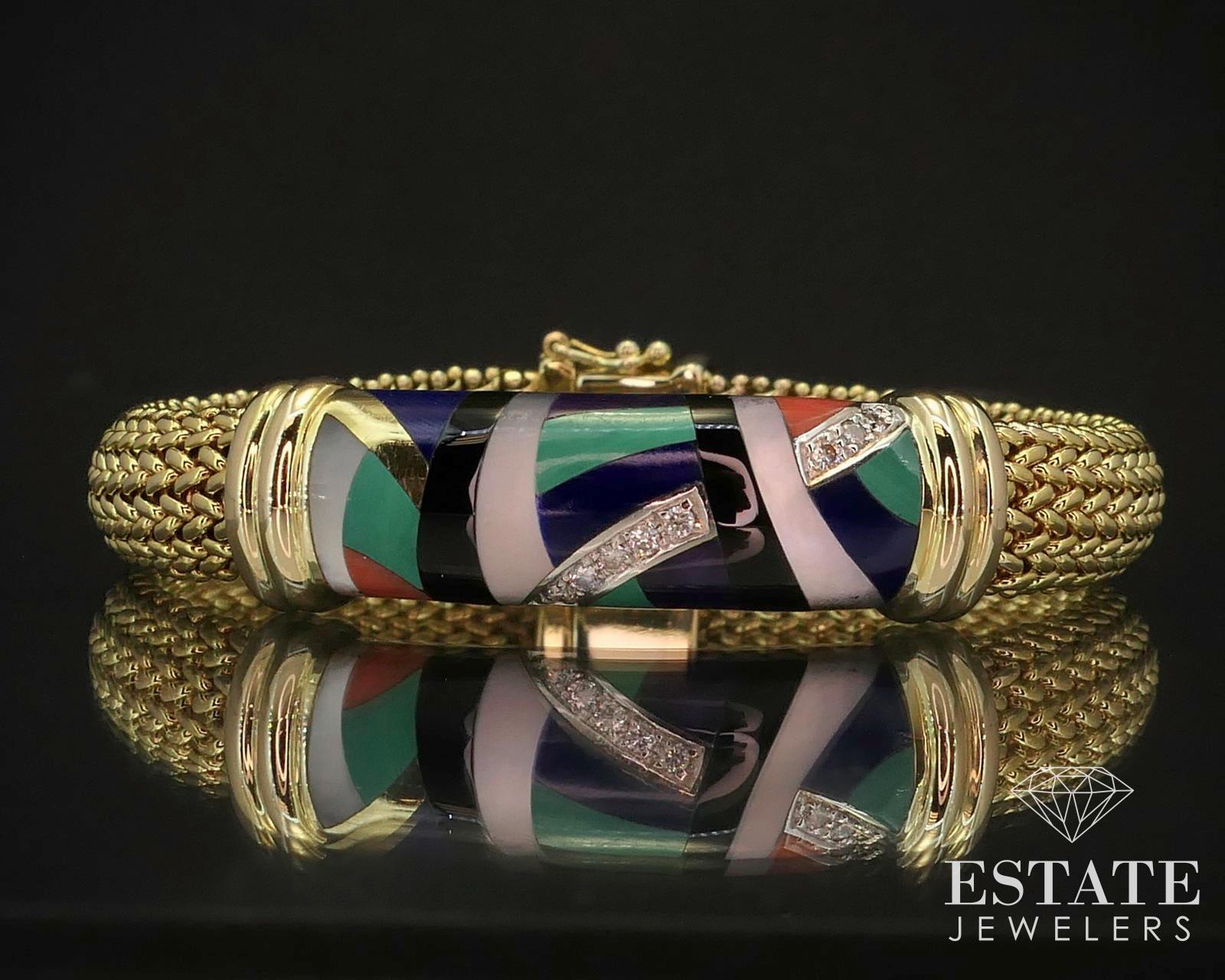 Stunning genuine Asch Grossbardt piece with inlaid mother of pearl, malachite, lapis, coral and black onyx with diamond accents. Approximately .12ctw of diamonds with VS2 clarity and G color. 7