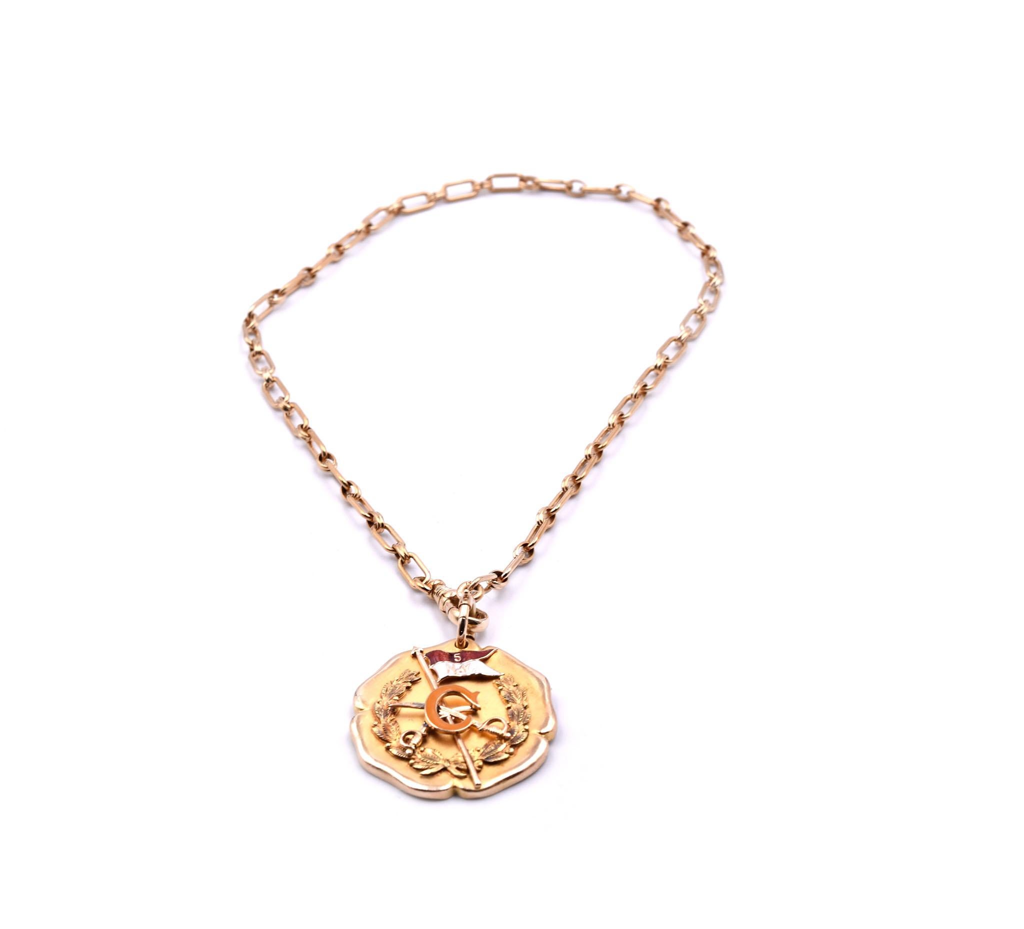 Designer: custom design
Material: 14k yellow gold
Dimensions: chain on FOB is 14 ½-inches long and FOP is 32.20mm in circumference. 
Special Engraving Note: “To Crop. William E. Coykendall, squadron C. N.G.N.Y from the Rookie Squad of 1908-09. May