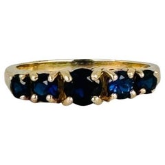 14k Yellow Gold Ring Five round-Cut Dark Blue Sapphires of about 0.95 carat