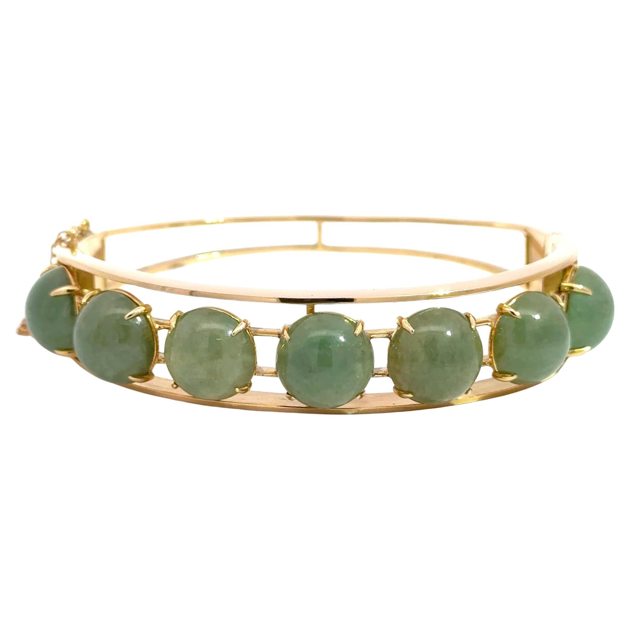 14k Yellow Gold Bangle with 7 Green Jade Cabochons – 29.20g of Timeless Elegance For Sale