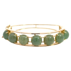 14k Yellow Gold Bangle with 7 Green Jade Cabochons – 29.20g of Timeless Elegance