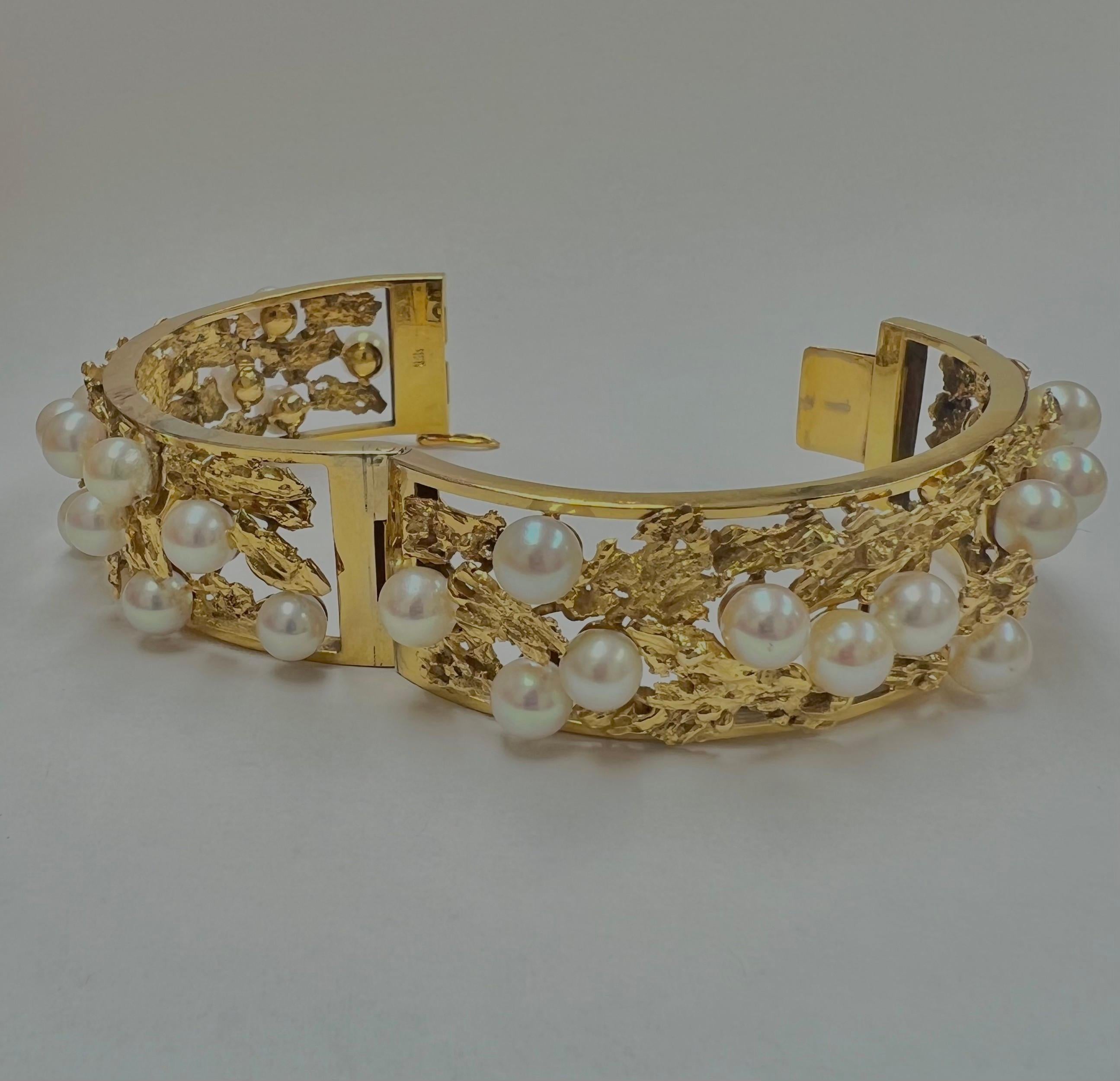 Showcasing a beautiful all natural beautiful Pearl Bangle. This is a staple piece in anyone's jewelry collection. It was carefully handmade in Los Angeles California and polished in 14k yellow gold. The bangle features a very unique and pristine