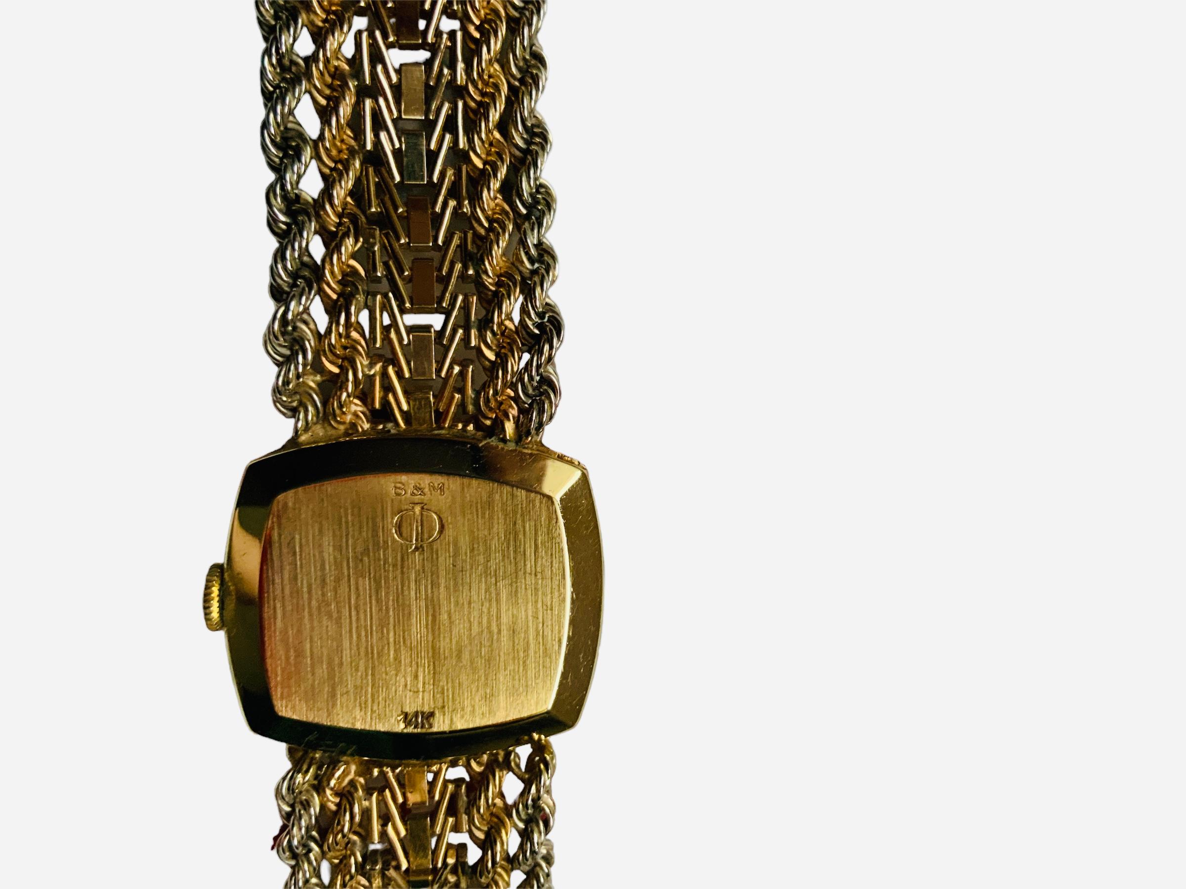 Montre-bracelet pour femmes en or jaune 14k Baume & Mercier en vente 7