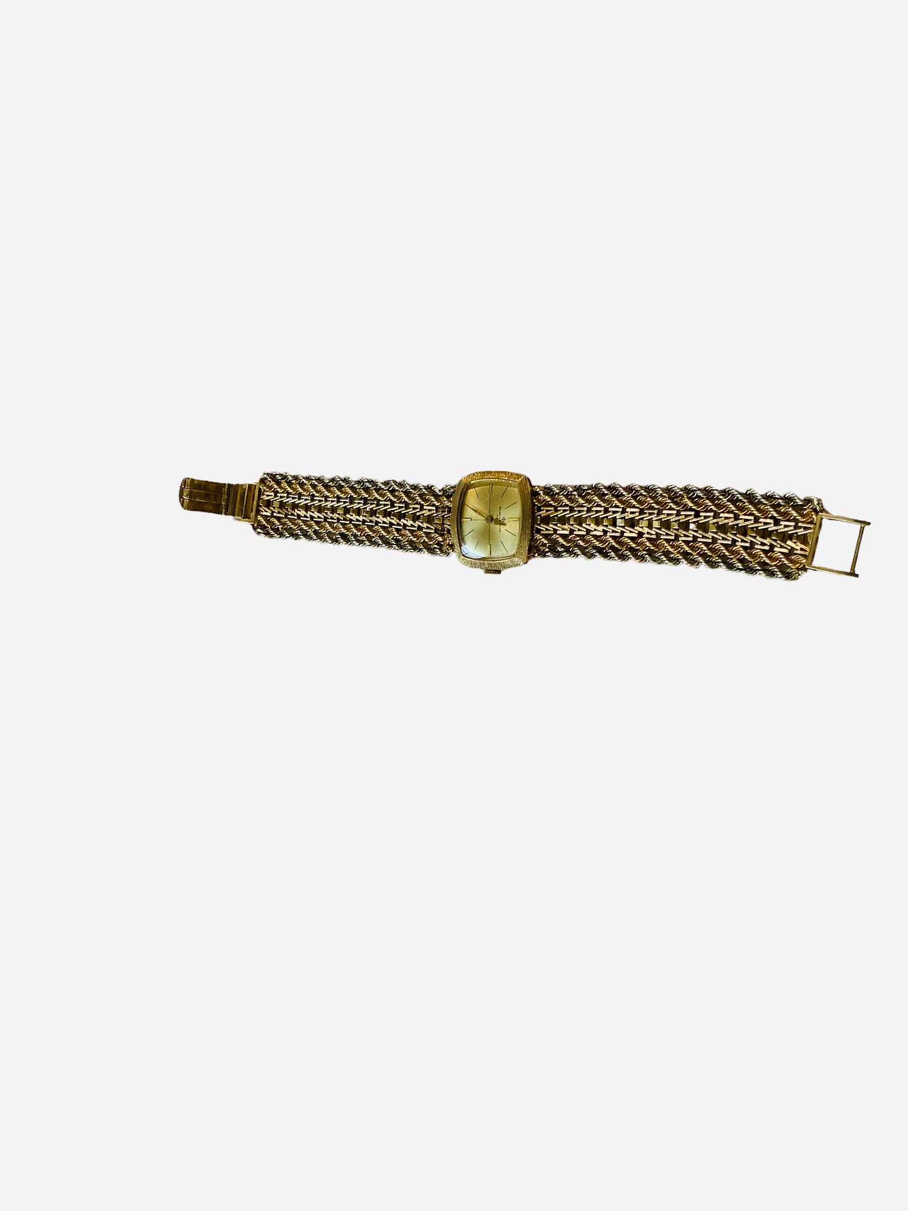 Montre-bracelet pour femmes en or jaune 14k Baume & Mercier Bon état - En vente à Guaynabo, PR