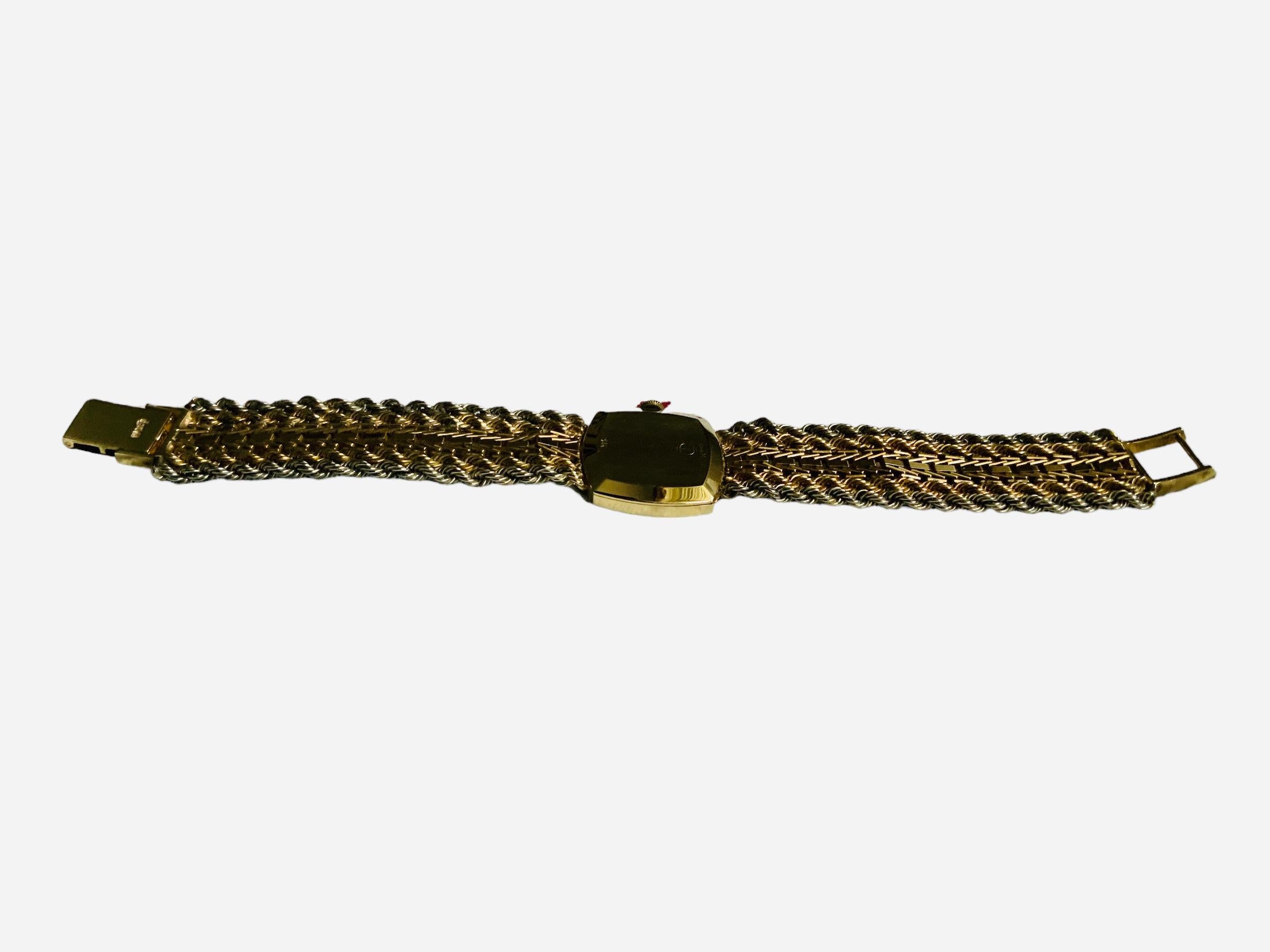 Montre-bracelet pour femmes en or jaune 14k Baume & Mercier en vente 2