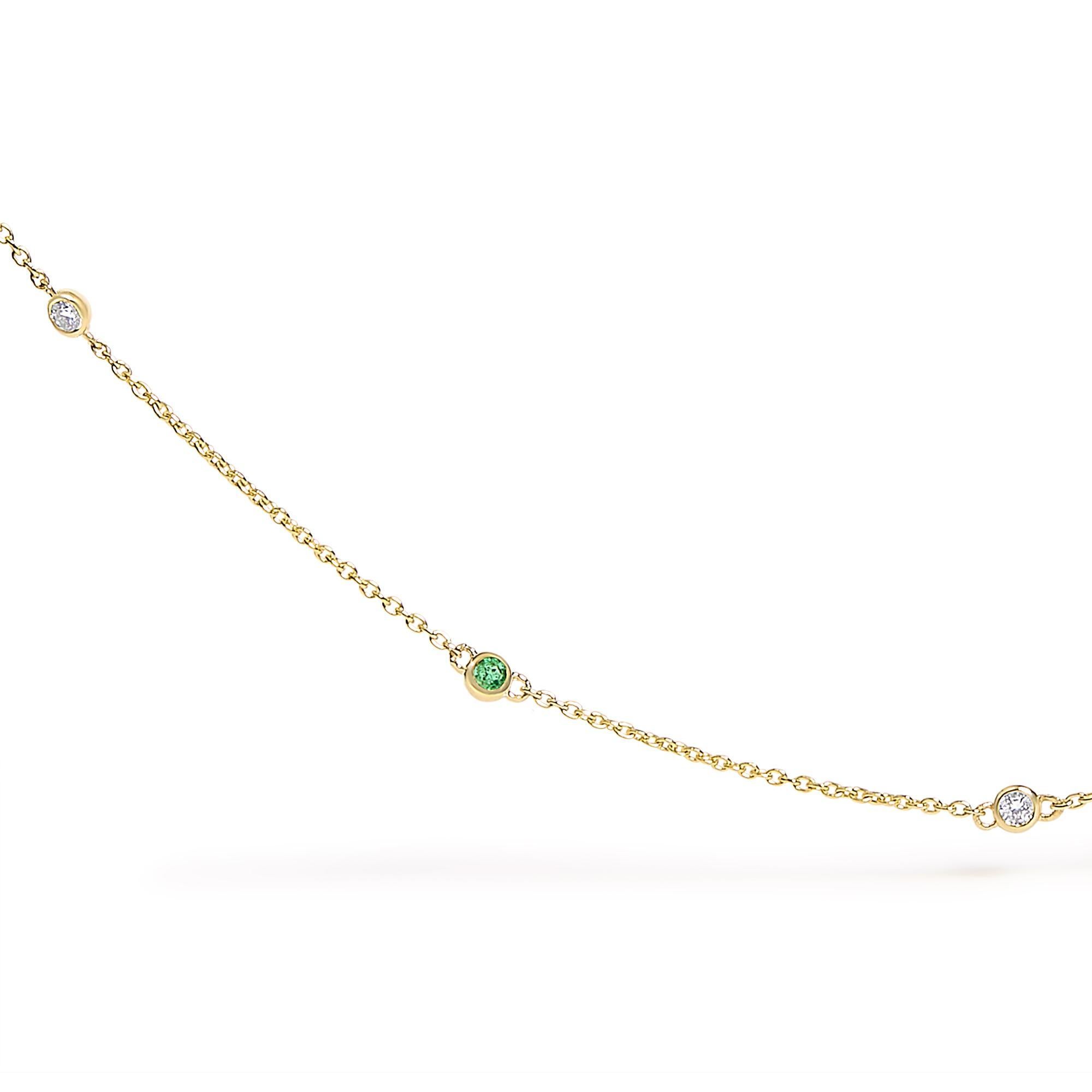 Capturing the rich symphony of nature's splendor and the magnificence of bespoke craftsmanship, this necklace spins a tapestry of luxe and elegance with its 14k yellow gold base and delicately placed gems. Alternating in harmonious balance, the