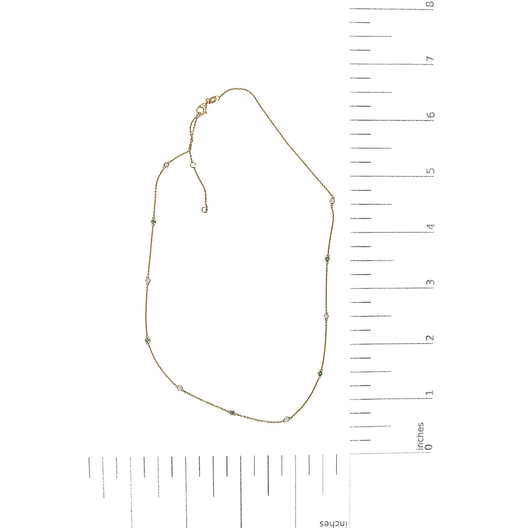 14K Yellow Gold Bezel Set Alternating Green Emerald and Diamond Station Necklace In New Condition For Sale In New York, NY