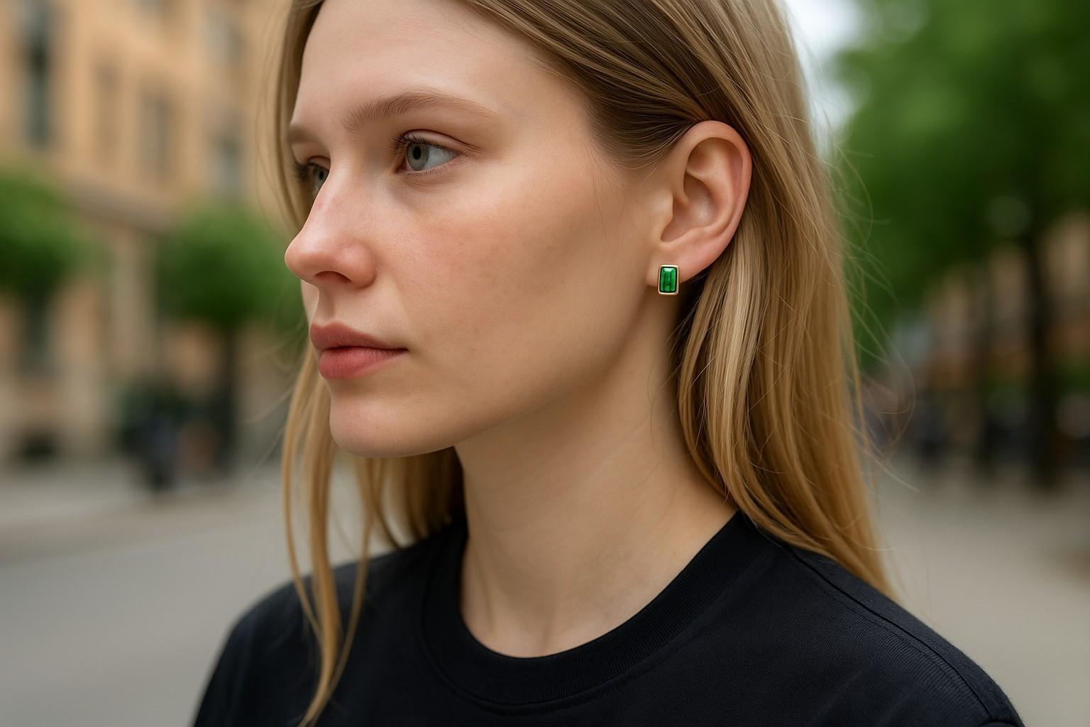 Enhance your elegance with these exquisite 14K Yellow Gold Bezel-set Colombian Emerald Stud Earrings. Featuring two perfectly matched emerald-shaped Colombian emeralds, these earrings are a timeless addition to any jewelry collection.
Product