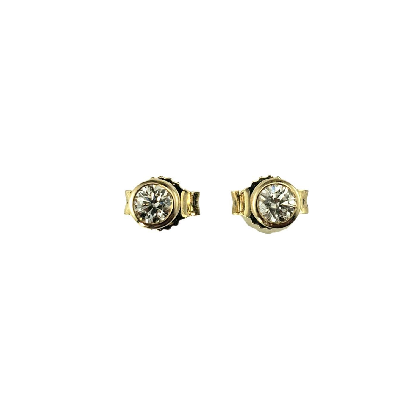 Orecchini con diamanti incastonati in oro giallo 14K #23085