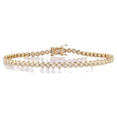 Bracciale Tennis con diamanti incastonati in oro giallo 14K