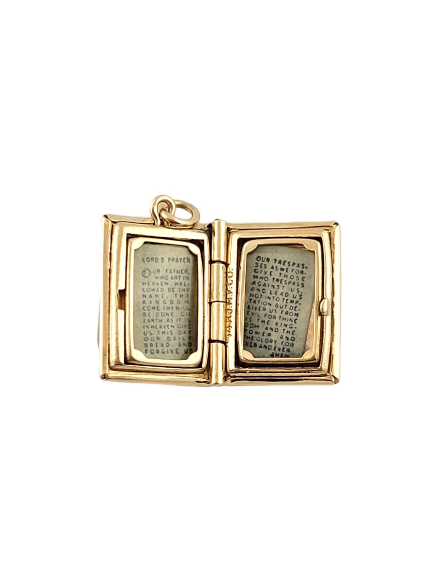 Vintage 14K Yellow Gold Bible Charm Locket

This beautiful 14K gold locket has a mother of pearl inlay with a gold cross on the front!

Size: 16mm X 11mm X 6mm
Length w/ bail: 19.5mm

Weight: 2.7 g/ 1.7 dwt

Hallmark: 14K JMF

Very good condition,