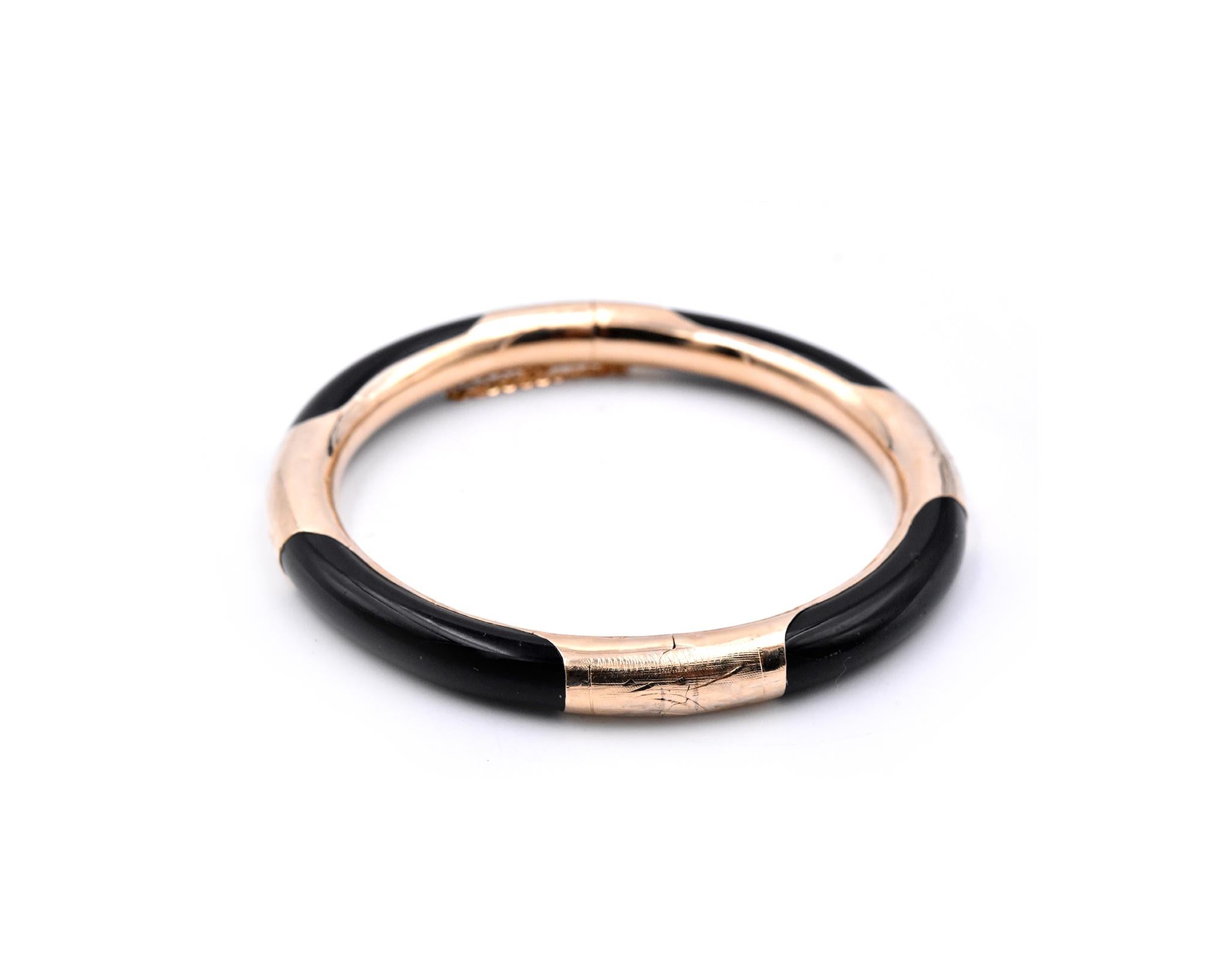 Designer: Custom
Material: 14k yellow gold
Gemstone: Jade
Dimensions: Bracelet will fit a 7 in. wrist
Weight: 21.7 grams
