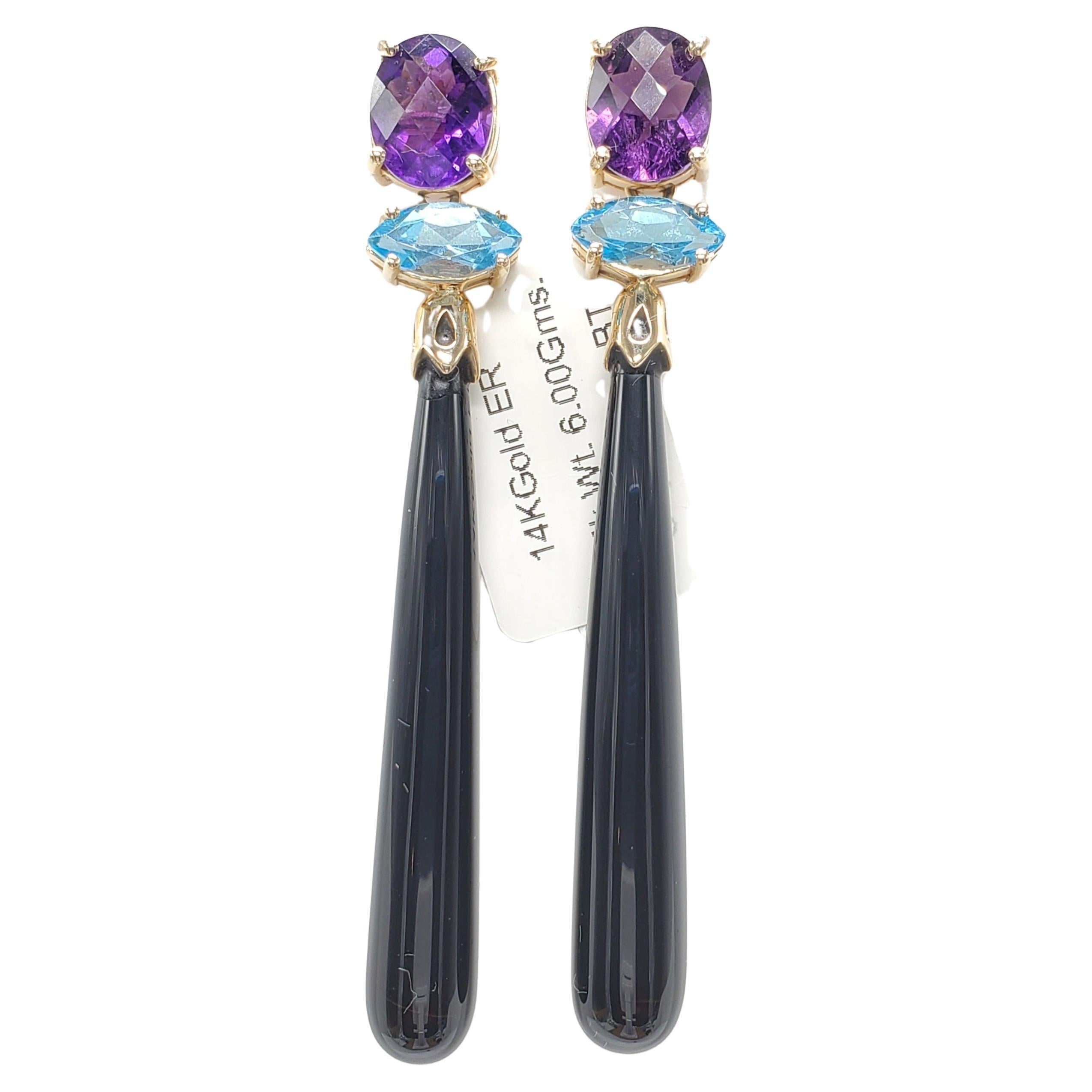 14K solid yellow gold Black onyx, amethyst and Blue Topaz Earring.
long dangling ,beautiful combination of colors  .
total length is about 2.5 inch long.