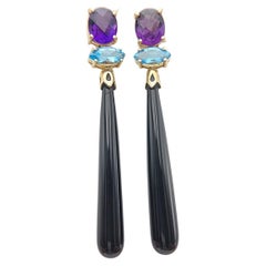 Boucle d'oreille en or jaune 14K Onyx noir, améthyste et topaze bleue.