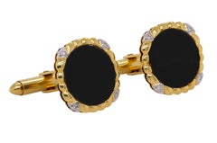 Gemelli da abito in oro giallo 14 carati con onice nero e diamanti: un paio classico ed elegante