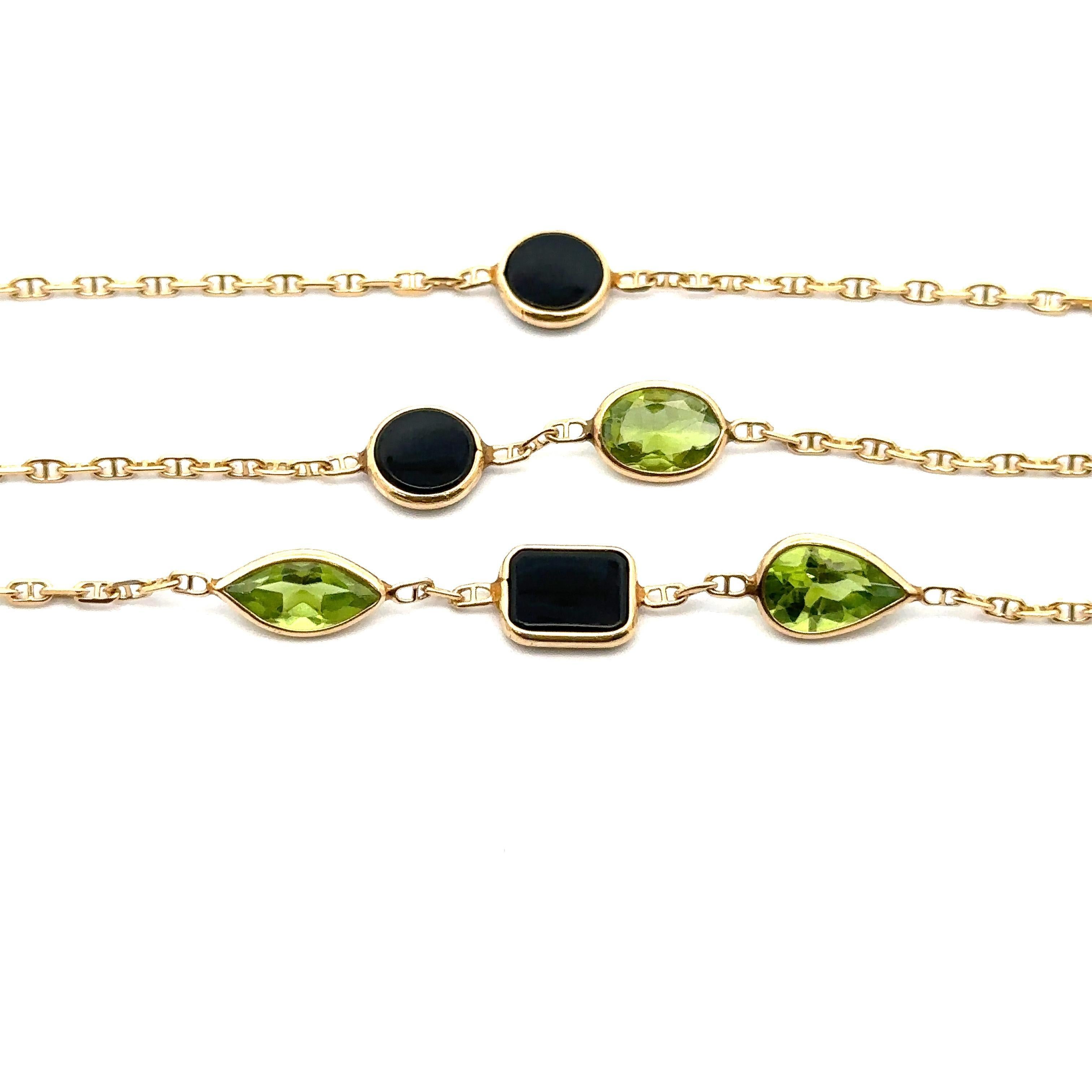 --Stone(s):--
(12) Natural Genuine Black Onyx - Round, Rectangular & Heart Cut - Bezel Set - Black Color 
(12) Natural Genuine Peridot - Oval, Pear & Amethyst Cut - Bezel Set - Lime Green Color

Material: 14k Solid Yellow Gold
Weight: 13.07