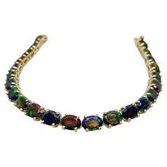 Pulsera de tenis de oro amarillo de 14 quilates con ópalo negro, 18,0 quilates Declaración 7,5 pulgadas