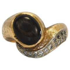 Vintage 14K Yellow Gold Black Star Sapphire and Diamond Ring