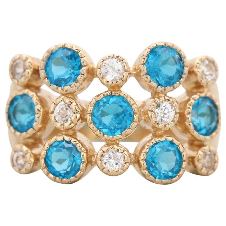 14 Karat Gold Blue Apatite and White Zircon Ring Bezel Set 3-Row Fashion Ring