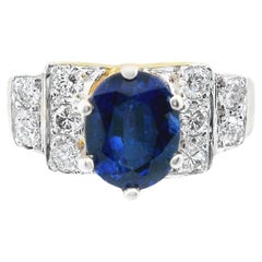 Ring aus 14 Karat Gelbgold mit blauem Saphir und Diamant