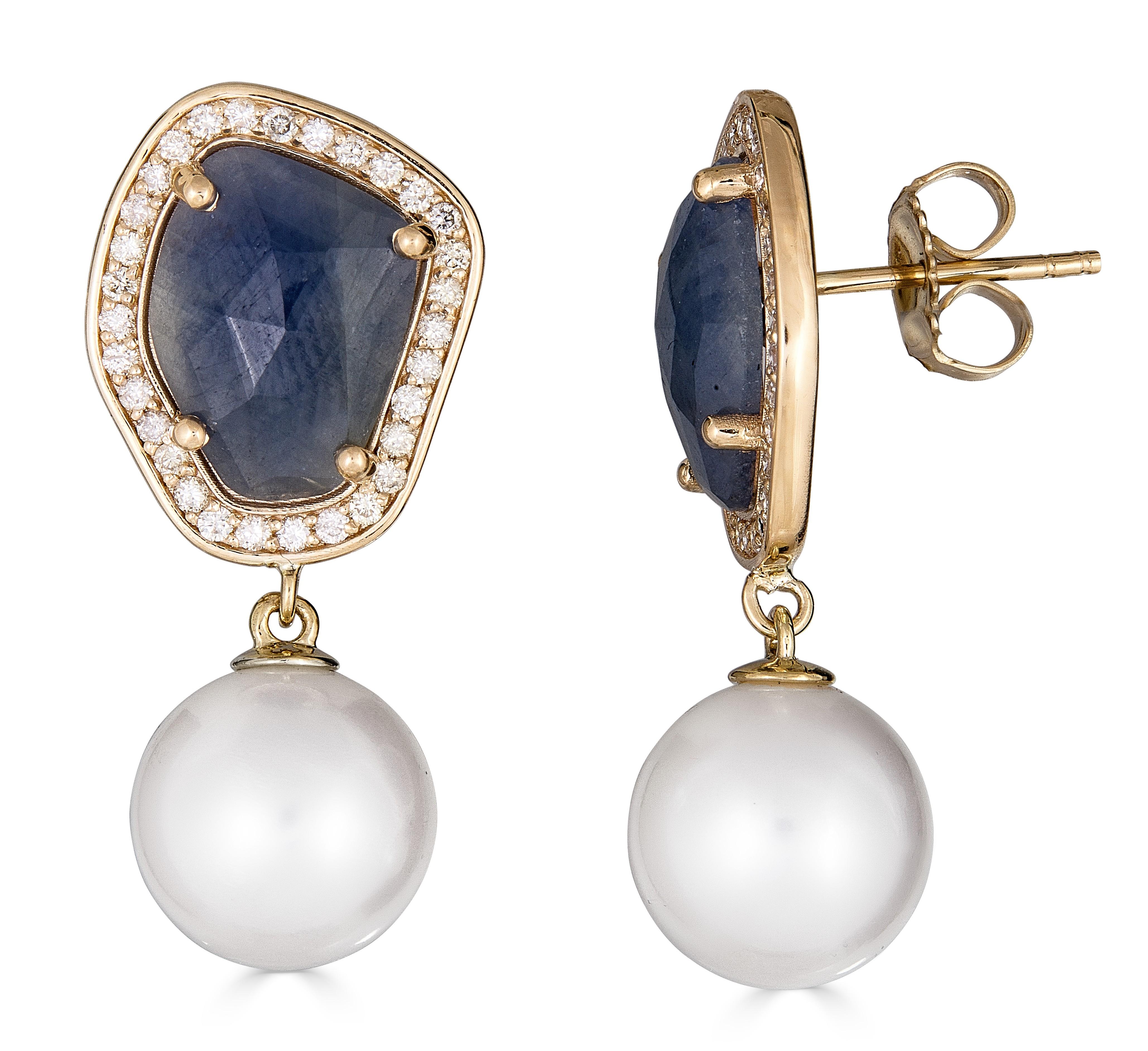 These one-of-a-kind earrings are designed to emphasize the wild and raw beauty of the natural sapphires, combined with the natural elegance of freshwater pearls.

Each earring features a lustrous, 11-13mm freshwater pearl suspended from a