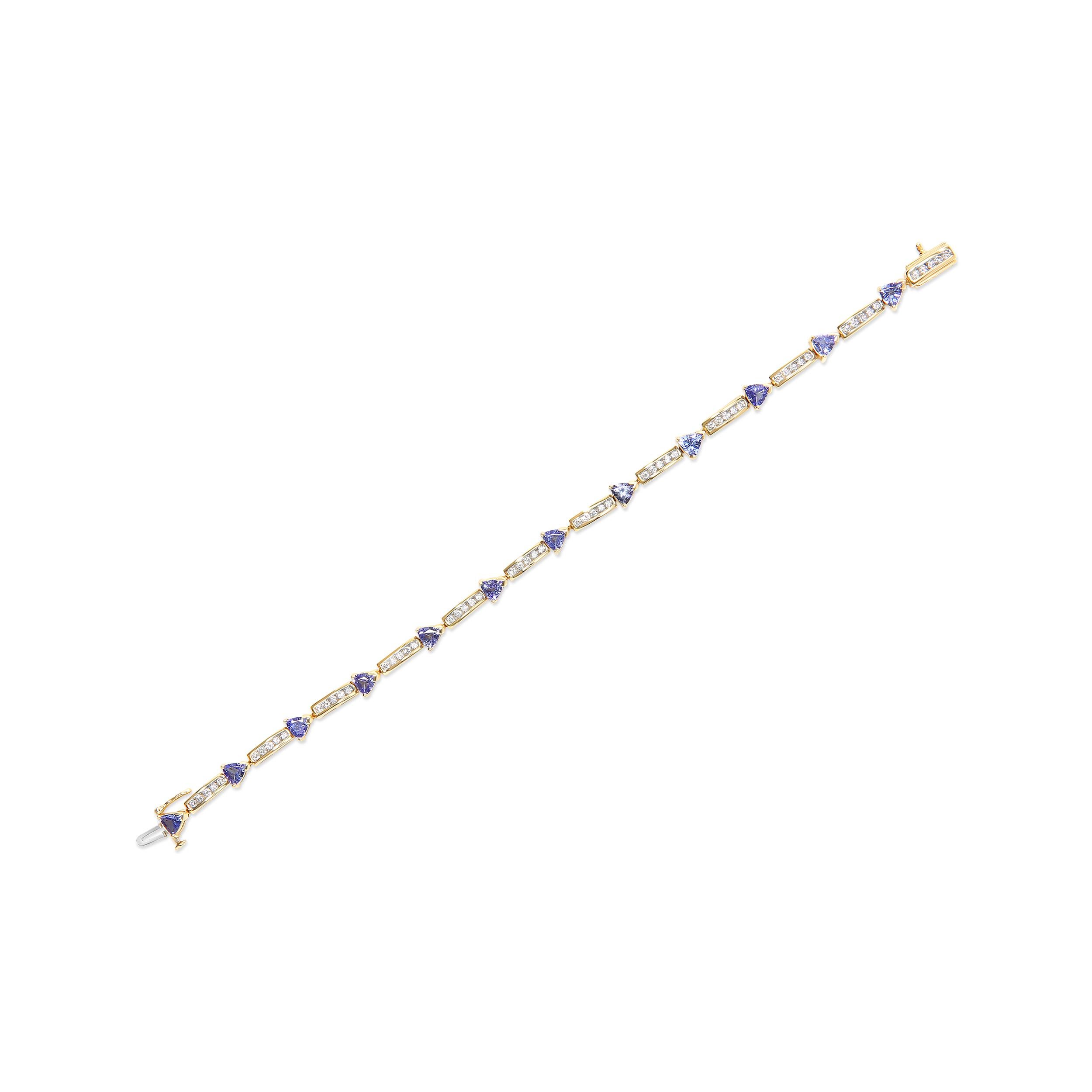 Contemporary 14K Yellow Gold Blue Tanzanite and 1 1/10 Carat Diamond Tennis Bracelet For Sale