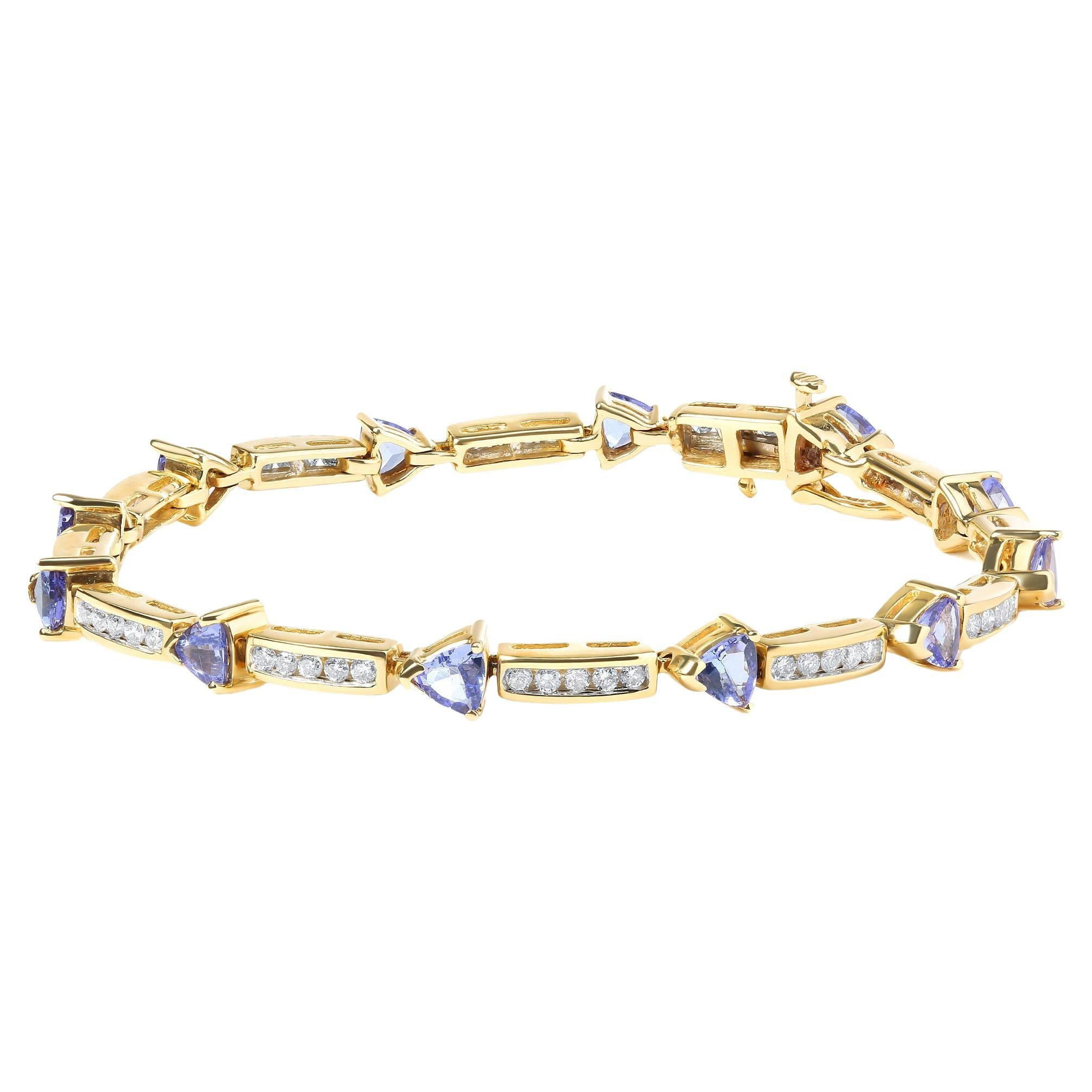 14K Yellow Gold Blue Tanzanite and 1 1/10 Carat Diamond Tennis Bracelet For Sale