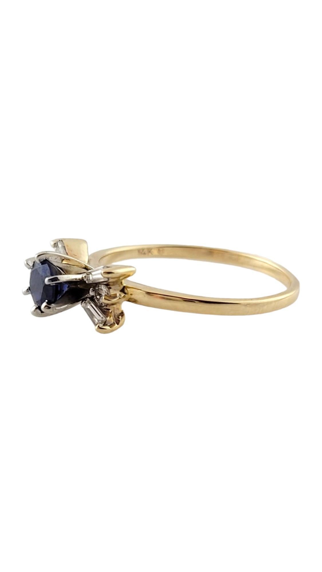 Vintage 14K Yellow Gold Blue Tanzanite and Diamond Ring Size 8.25

This stunning piece features a beautiful lab tested blue tanzanite stone with 2 round cut diamonds and 4 baguette cut diamonds all set in 14K yellow gold for a breathe taking