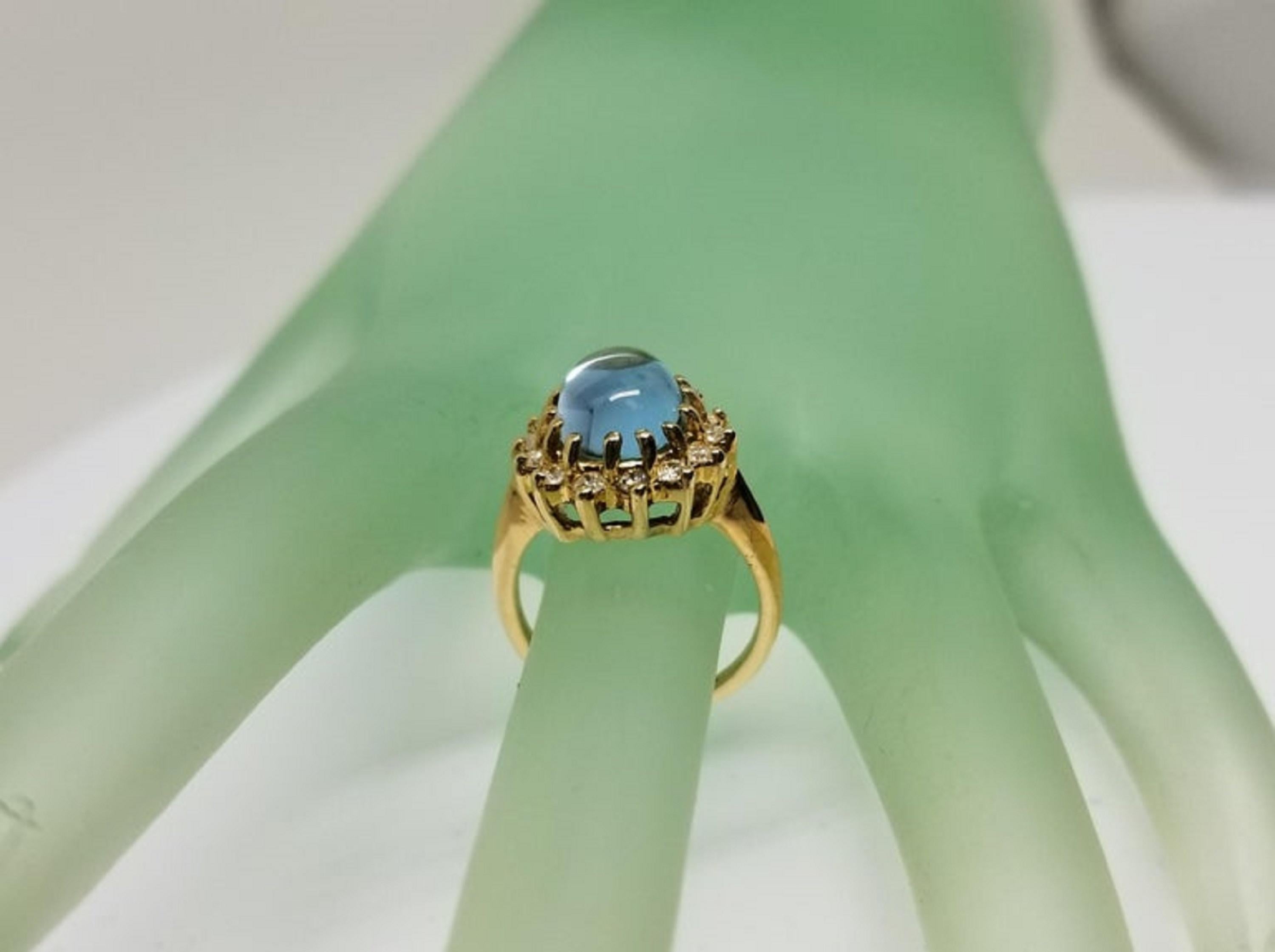 Oval Cut 14 Karat Yellow Gold Blue Topaz Cabochon and Diamond Ring For Sale