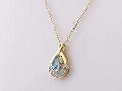 14K Yellow Gold Blue Topaz & Diamond Pendant Necklace