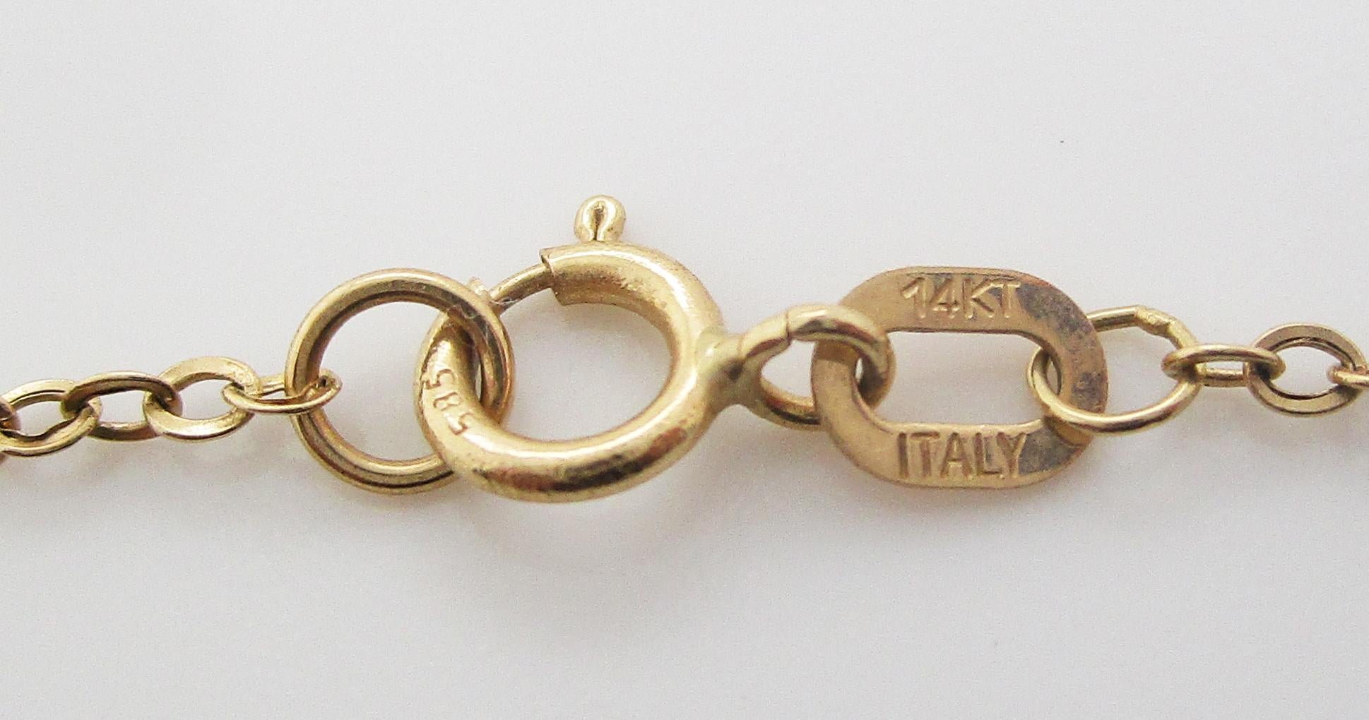 14 Karat Yellow Gold Blue Topaz Pendant and Chain 1