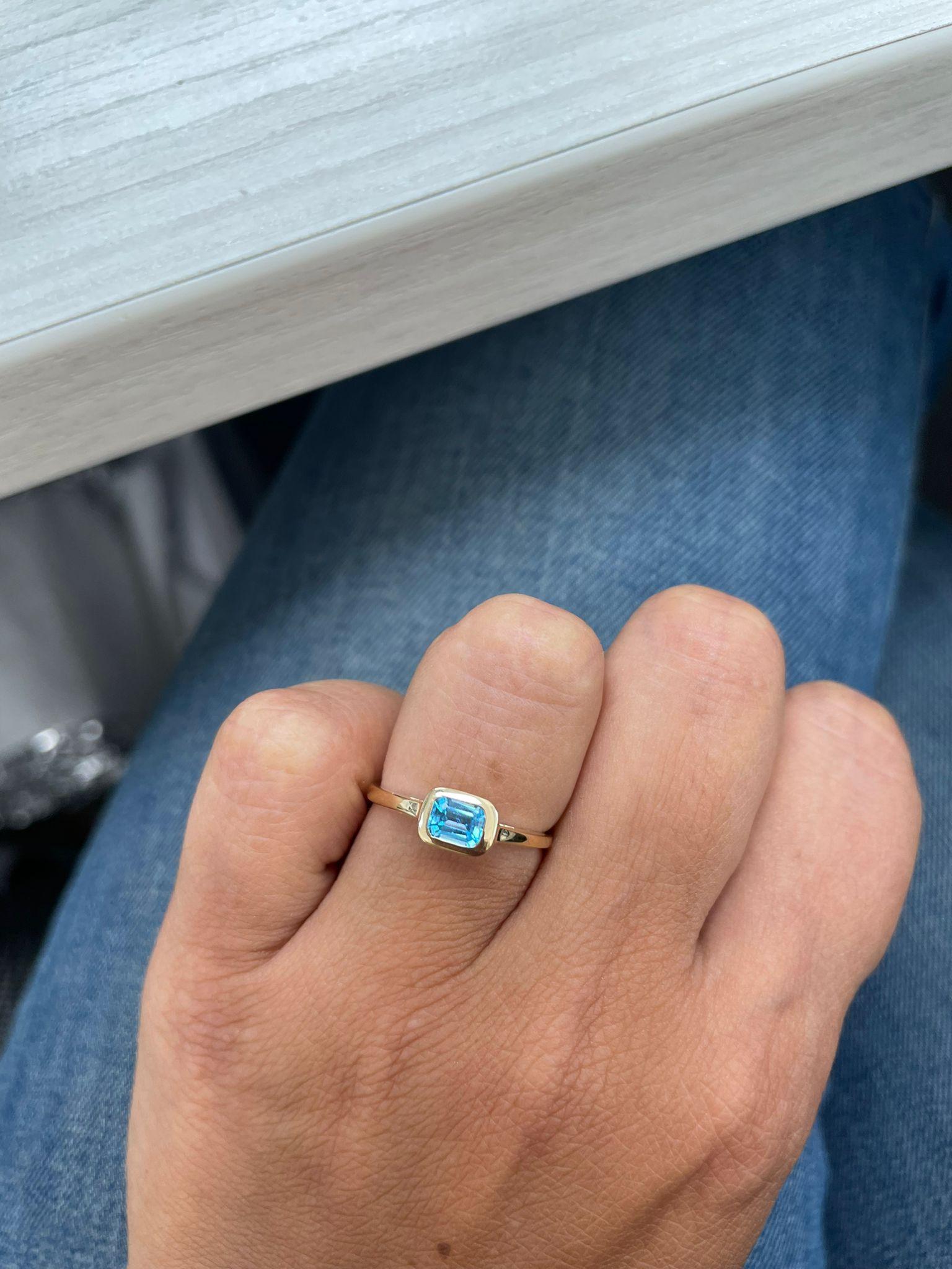 Charming Design - This stackable ring features a 14k gold band, and a emerald cut shaped gorgeous Blue Topaz approximately 0.50cts, available in  white, yellow and rose gold
 Measurements for ring size: The finger Size of this sapphire ring is 6.5