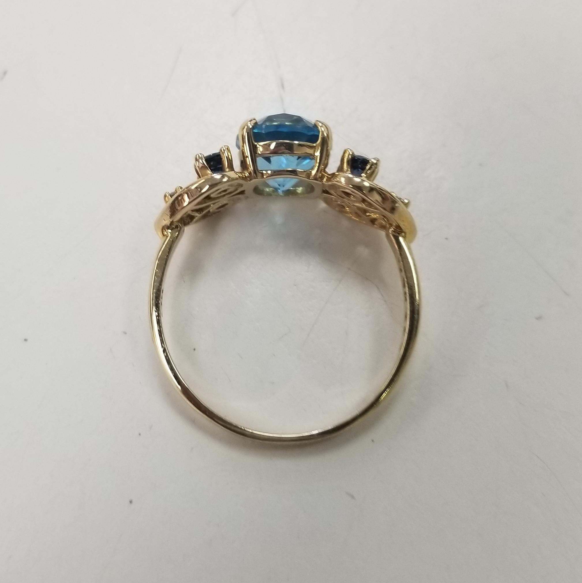 Women's or Men's 14k yellow gold Blue Topaz, Sapphire and Diamond ring and earring set For Sale
