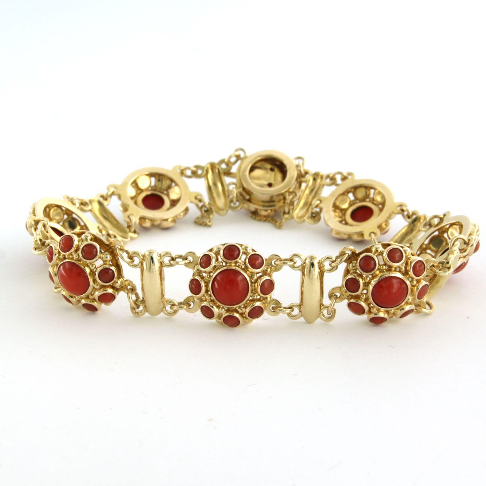 14k yellow gold bracelet set with Corallium Rubrum - 19 cm long

detailed description

 the length of the bracelet is 19 cm long by 1.3 cm wide and 6.0 mm high

total weight: 21.8 grams

occupied with:

- 72 x 2.6 mm - 6.4 mm round cabochon cut