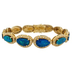 Pulsera de Oro Amarillo de 14k con Ópalos Negros Australianos y Diamantes