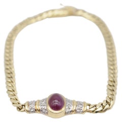 14K yellow gold bracelet with red cabochon and diamonds