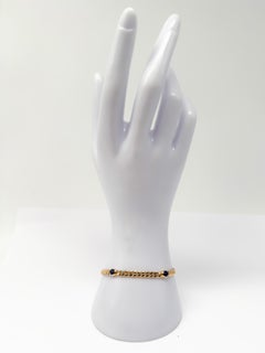 Pulsera de oro amarillo de 14 quilates con zafiros