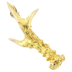 14k yellow gold branch brooch in the shape of a rooster
s foot - 8.5 grams
