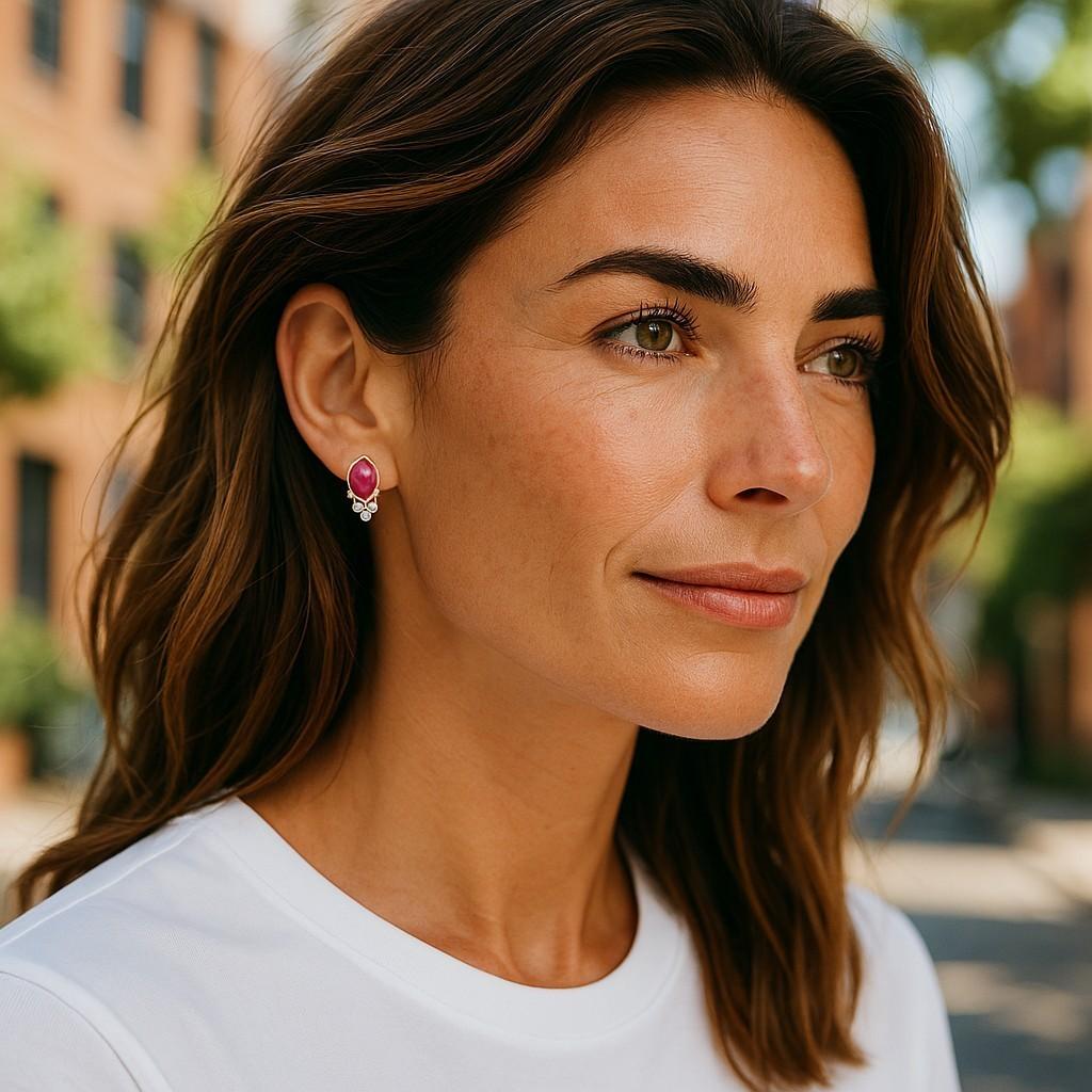 A Timeless Expression of Elegance and Craftsmanship
Step into a world of exquisite luxury with these 14K Yellow Gold Burma Cabochon Ruby and Diamond Stud Earrings. Each element—carefully selected Burmese rubies, radiant diamonds, and warm yellow