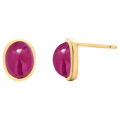 Ohrstecker aus 14 Karat Gelbgold mit Burma-Cabochon-Rubin-Lünette in Lünettenfassung