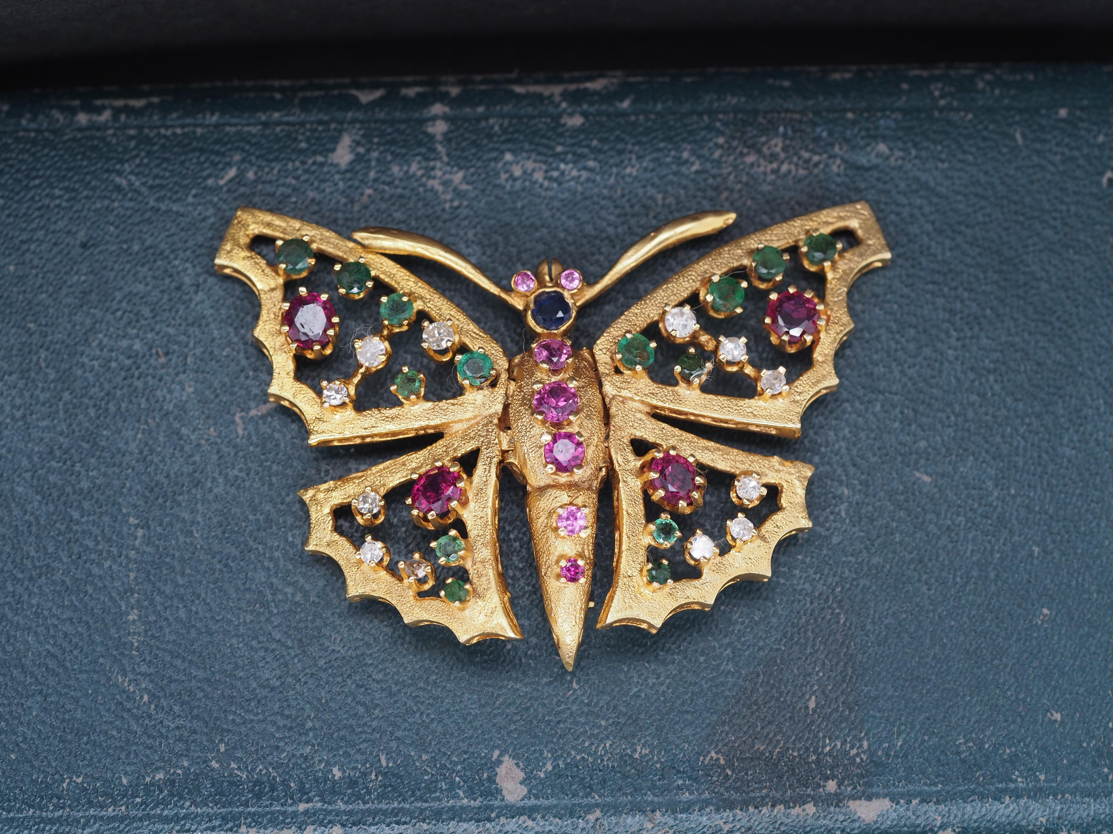 Year: 1990s
Item Details:
Metal Type: 14k yellow gold [Hallmarked, and Tested]
Weight: 13.2 grams
Color Stone Details: Rubies, Diamonds, Sapphire and Emeralds. Natural Stones, 1.25ct total weight.
Pin Measurements:
2 inch x 1.25 inch
Condition: